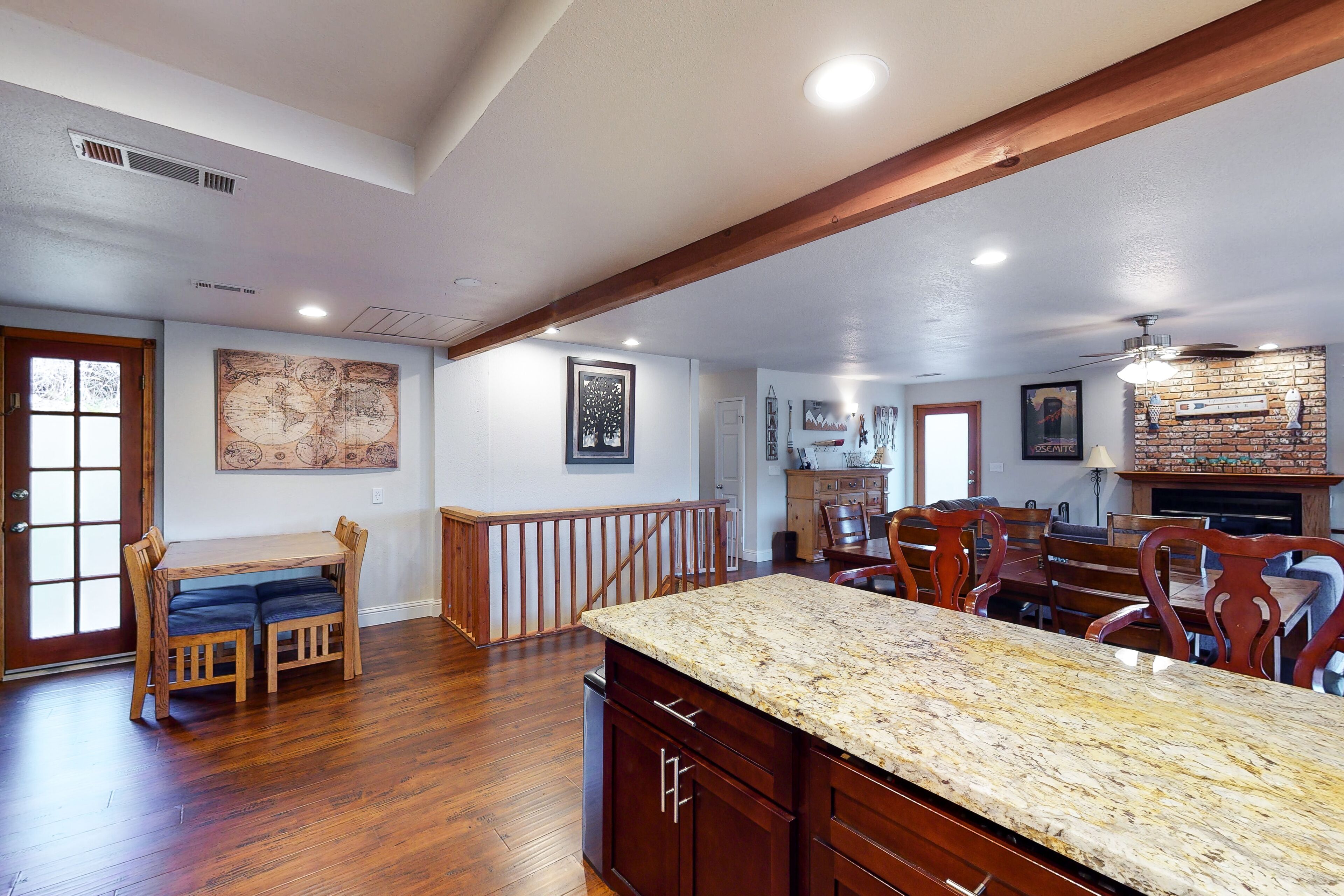 Dog-friendly lake-view home with boat slip, lovely deck, wood fireplace & games