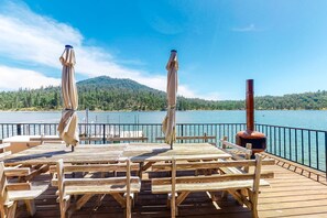 Outdoor dining - Lakefront home w/recreation room, hot tub, central AC, WiFi, private dock, & W/D (Bass Lake)