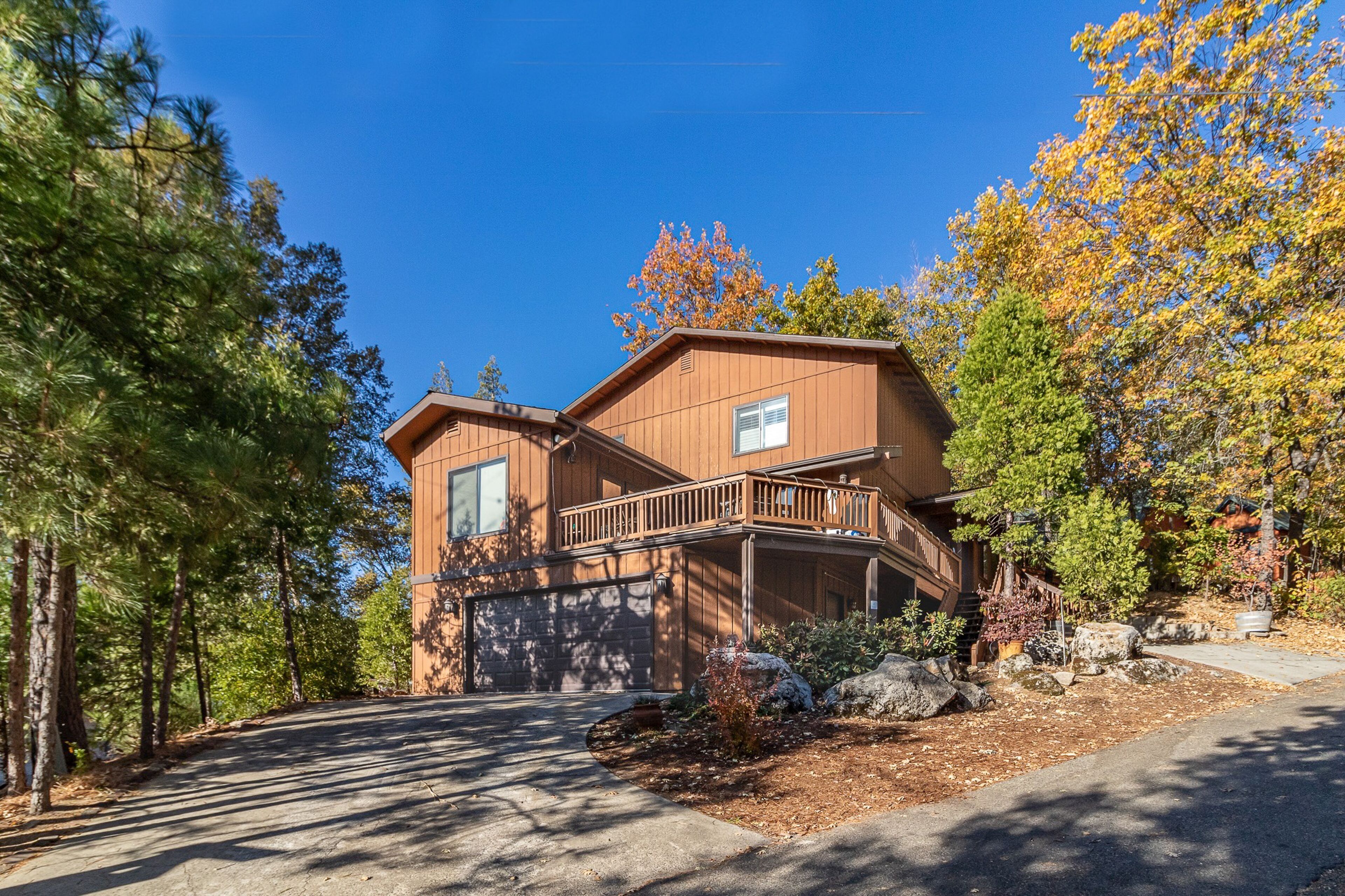 Lake view getaway at Bass Lake with boat slip, swimming access, 2 decks & WiFi