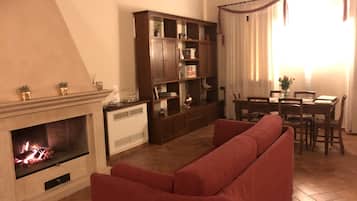 Apartment | Living room | 30-inch TV with cable channels