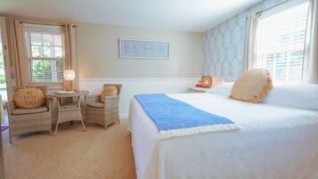 1 quarto, ferros/tábuas de passar roupa, berço de viagem