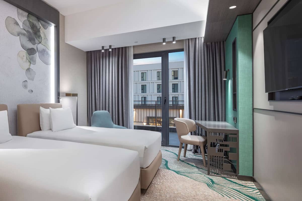 room, 2 single beds | in-room safe, desk, iron/ironing board, free wifi