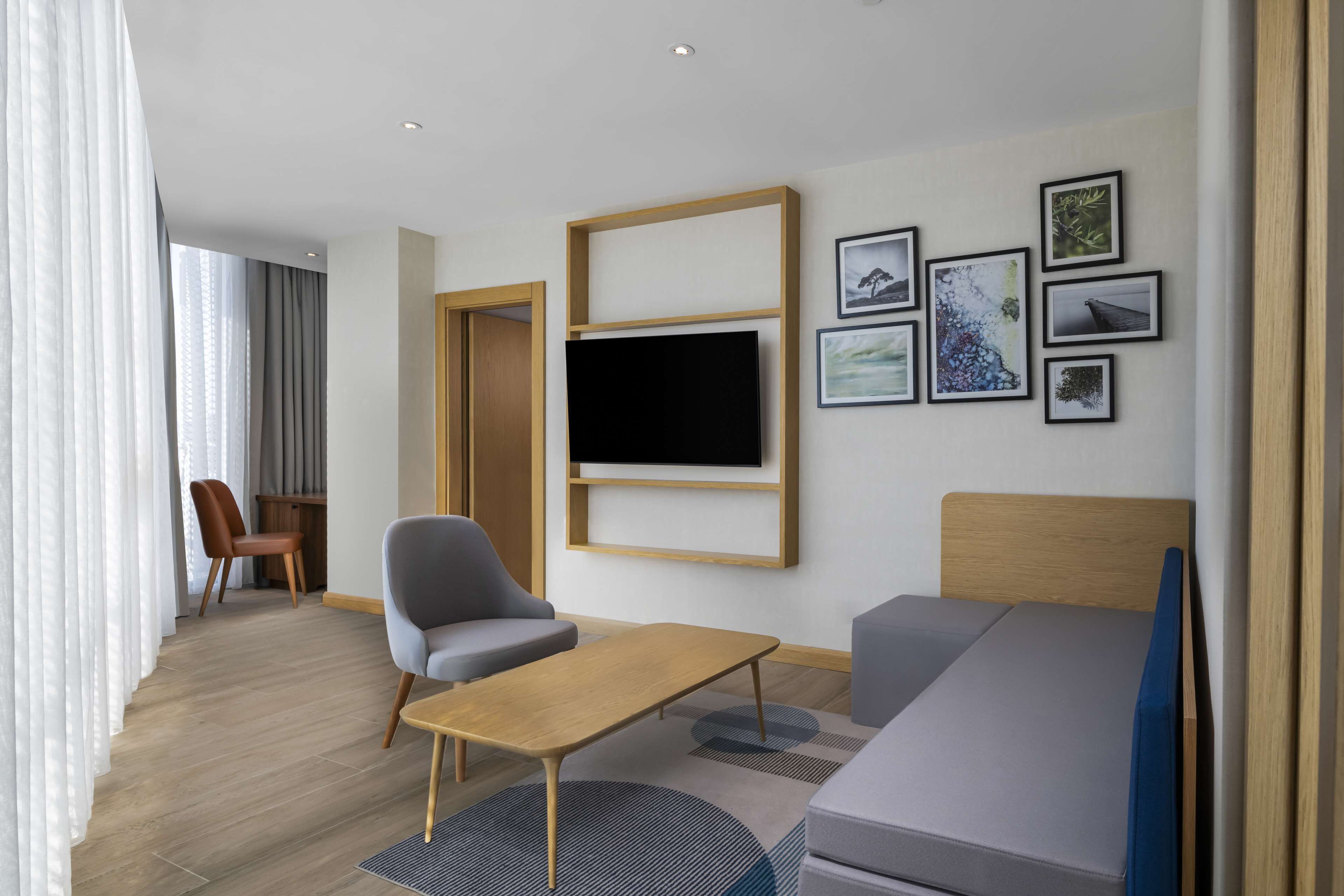 Suite, 1 Bedroom | Living area | 52-inch LED TV with satellite channels