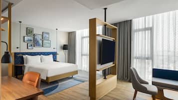 Deluxe Room, 1 King Bed with Sofa bed | Premium bedding, down comforters, in-room safe, desk