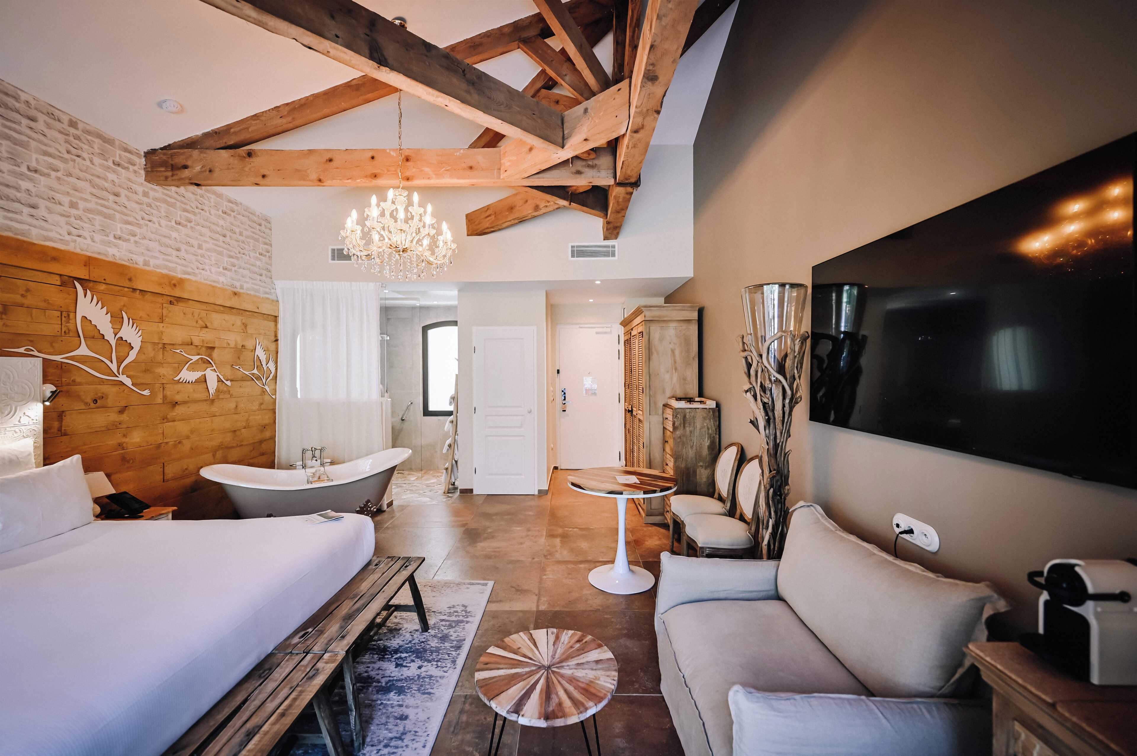 Pesquiers Village Room | Minibar (free items), in-room safe, soundproofing, iron/ironing board