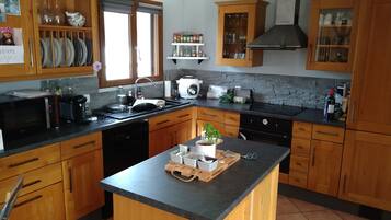 Oven, stovetop, dishwasher, dining tables