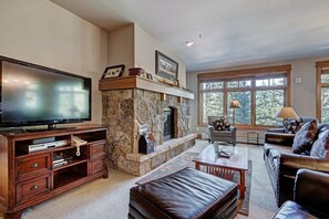 TV, fireplace - Luxury 3 BR in River Run Village Featuring Ski in, ski out! No Cleaning Fees! by RedAwning (Dillon)