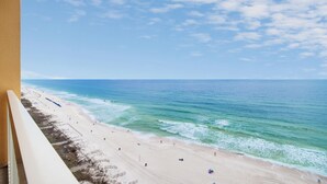A beach with a clear view of the ocean and a sandy shoreline. - Calypso By Blue Swell (Panama City Beach)