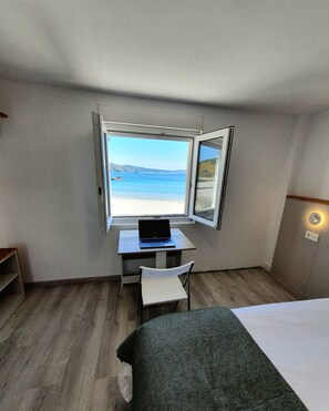 1 bedroom, desk, iron/ironing board, travel crib