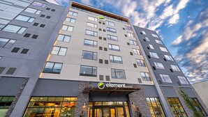 A multi-story hotel with a modern facade, large windows, and a prominent 'Element' sign. - Element by Marriott Colorado Springs Downtown (Colorado Springs)
