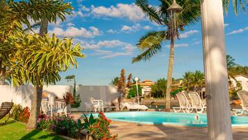 Outdoor pool, pool umbrellas, pool loungers
