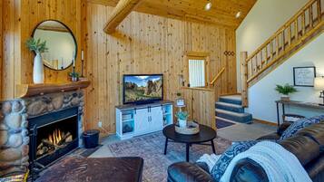 Smart TV, fireplace, DVD player, books