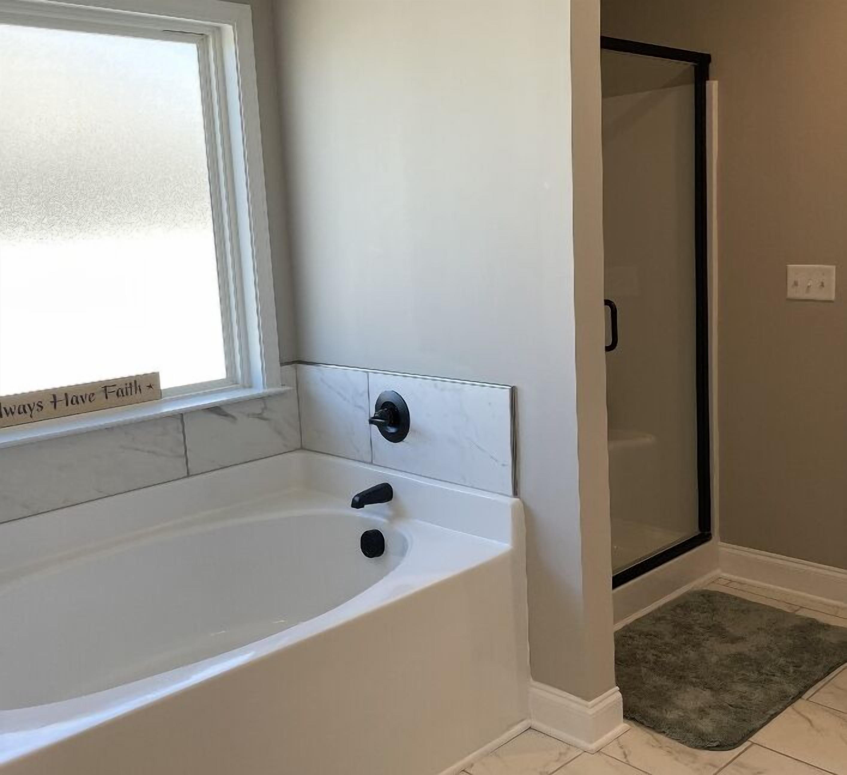 Combined shower/bathtub