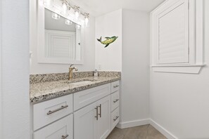Combined shower/bathtub, hair dryer, towels - Sandcastle Condominiums Unit 302 (Port Aransas)