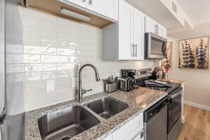 Fridge, microwave, oven, stovetop - Sandcastle Condominiums Unit 310 (Port Aransas)