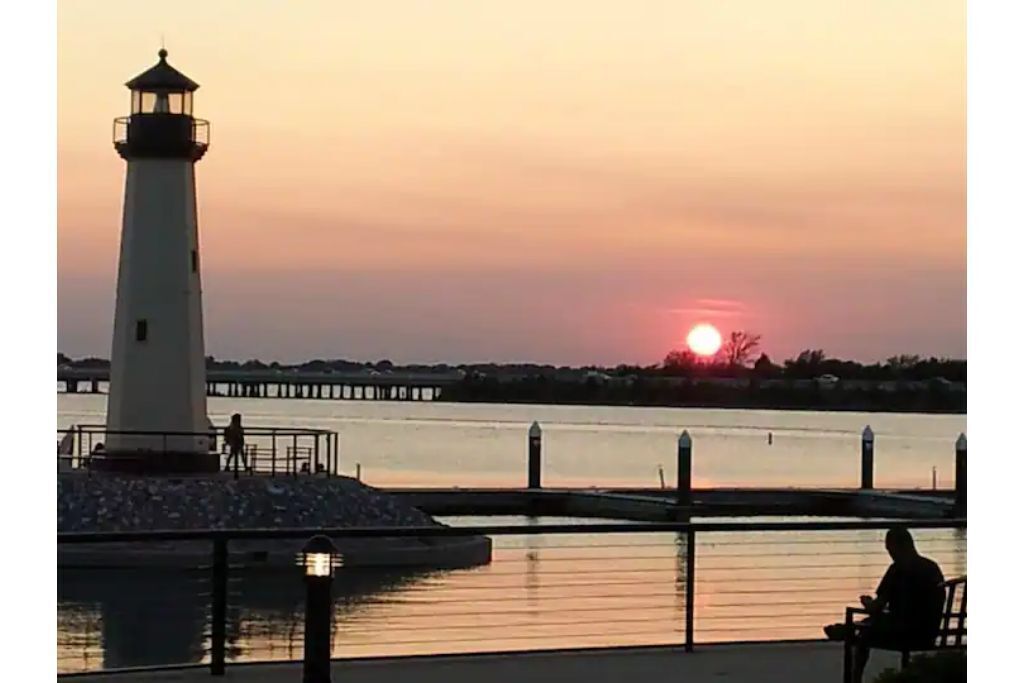 Lakefront Home w/ Game Room + outdoor oasis with firepit with a large king suite