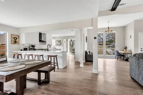 Lakefront Home w/ Game Room + outdoor oasis with firepit with a large king suite