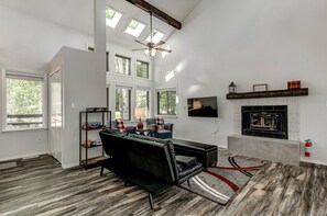 Smart TV, fireplace, books