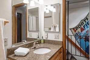 Townhome | Bathroom | Combined shower/tub, hair dryer, towels, soap
