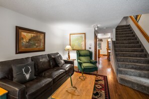 Townhome | Living room | 55-inch flat-screen TV with satellite channels, TV, fireplace