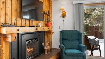 Townhome | Living room | 55-inch flat-screen TV with satellite channels, TV, fireplace