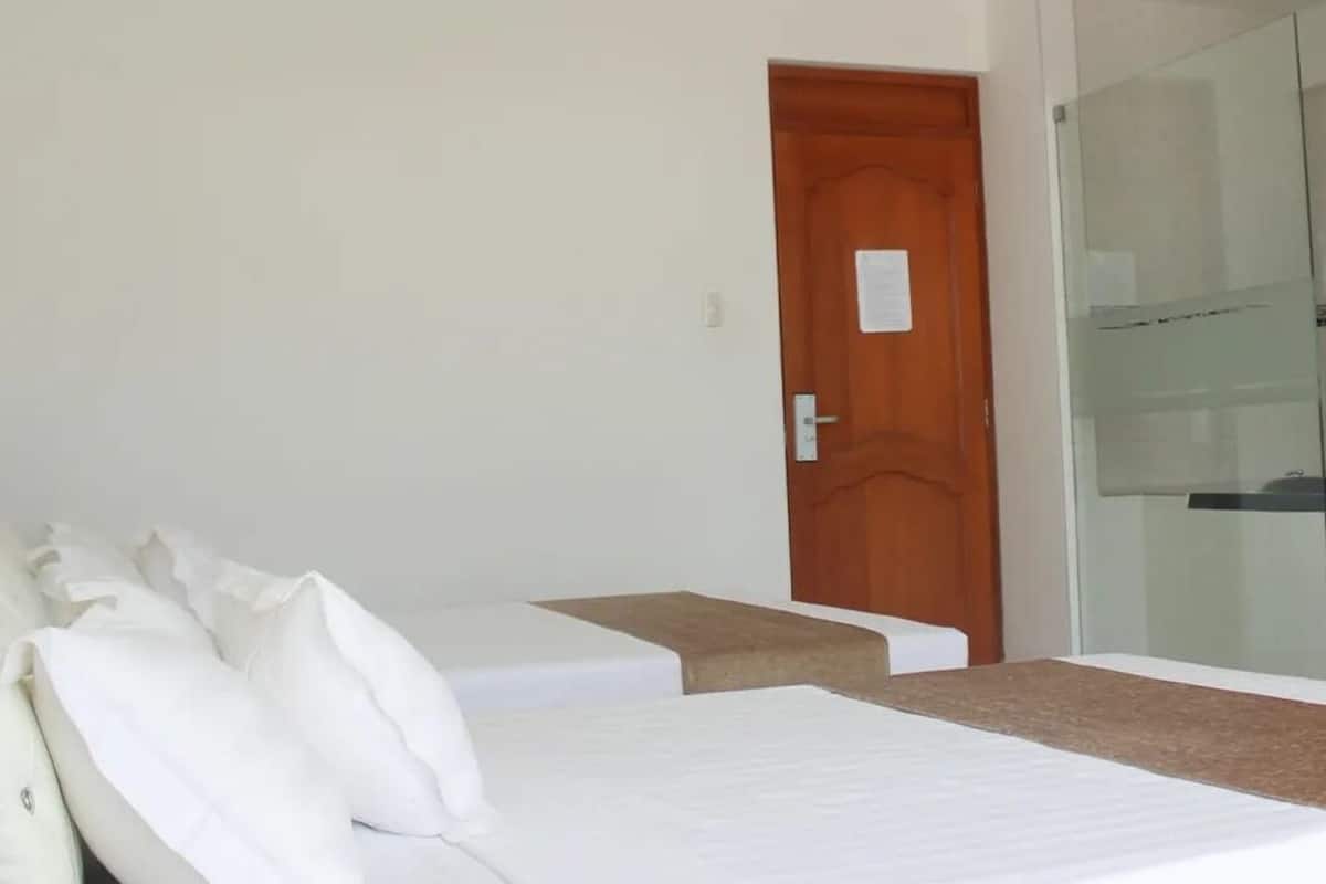 Comfort Double Room, 2 Queen Beds, Hot Tub, City View | Hypo-allergenic bedding, down comforters, in-room safe, free WiFi