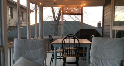 Sunny historic home with water views and large porch