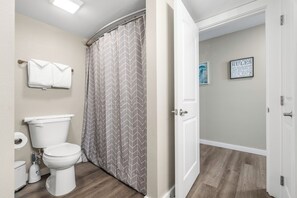 Combined shower/tub, hair dryer, towels - Sandcastle Condominiums Unit 314  (Port Aransas)