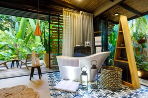 Deluxe Double Room, 1 King Bed, Garden View | Bathroom | Shower, designer toiletries, hair dryer, towels - awā Beachfront Hotel (Cahuita)