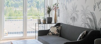 Close to the city center, balcony, parking space, lockable bike box with charging facility