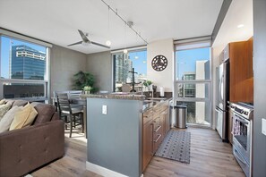 Fridge, microwave, oven, stovetop - Spacious 2 Bedroom Condo in the Heart of Downtown! (San Diego)