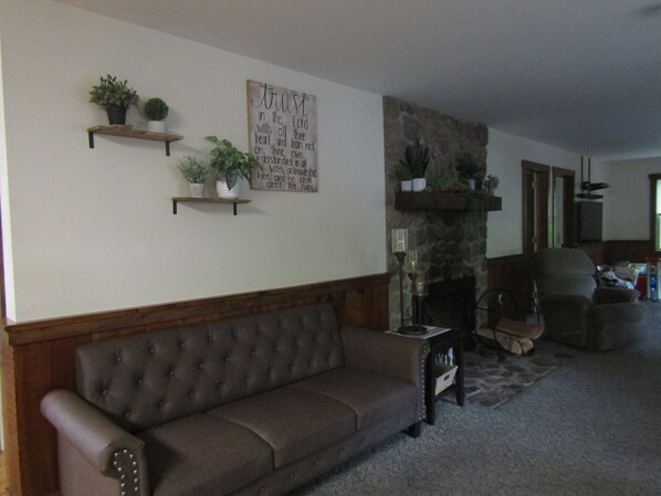 Smart TV, fireplace, foosball, books