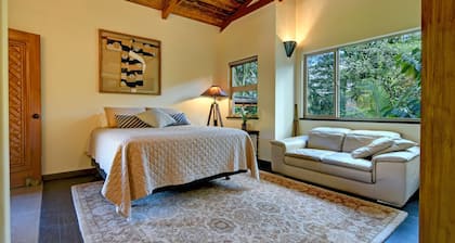 Escape to your private oasis perched on a cliff with a jungle view