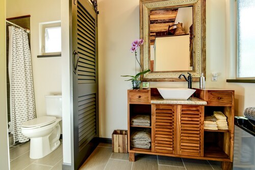 Escape to your private oasis perched on a cliff with a jungle view