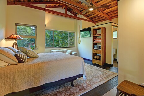 Escape to your private oasis perched on a cliff with a jungle view