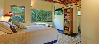 Escape to your private oasis perched on a cliff with a jungle view