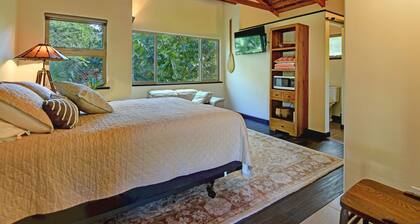 Escape to your private oasis perched on a cliff with a jungle view