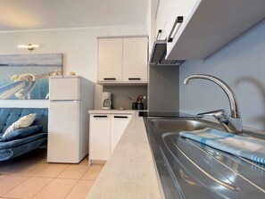 Frigorífic, forn, placa de cuina i torradora