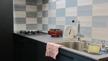Fridge, microwave, stovetop, cookware/dishes/utensils