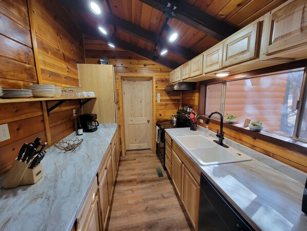 Fridge, microwave, oven, stovetop - Cozy Two Bedroom Cabin with Fireplace! (Lakeside)