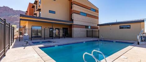 Seasonal outdoor pool, open 9:00 AM to 10:00 PM, sun loungers