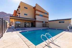 Seasonal outdoor pool, open 9:00 AM to 10:00 PM, sun loungers