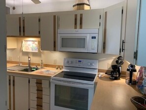 Fridge, microwave, oven, stovetop - 2 bdr on Water 1142 Nettles Blvd, Island Resort: Piers for 32 ft boat, hot tubs (Jensen Beach)