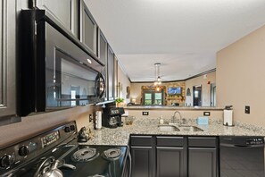 Condo, 1 Bedroom | Private kitchen | Fridge, oven, coffee/tea maker, toaster - A Bear's Hibernation 1 Bedroom Condo by RedAwning (Pigeon Forge)
