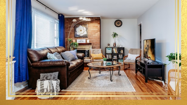 A living room with a brown leather sofa, a coffee table, and a TV stand. - Welcome to our charming and newly remodeled home, close to everything (Richfield)