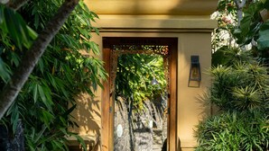 A pathway leading to a building with a sign reading "Residents Only". - TIRA VILAGNA SUITES & SPA (Kintamani)