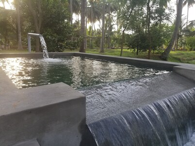 FarmStay near Pollachi amidst Coconut Trees with River Access