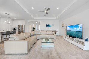 TV - Sleek & Sophisticated, Waterfront w/ pool & hot tub - Villa Azure - Roelens Vacations (Cape Coral)