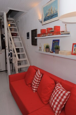 Traditional Duplex, 1 Bedroom | Living area | 30-inch flat-screen TV with digital channels, TV