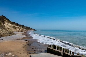 En la playa y playa de arena blanca